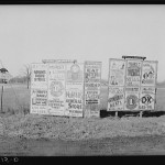 Signs along highway approaching Hurst 